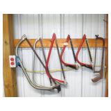Group of Bow Saws and a Hacksaw