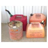 (3) Plastic Gas Cans and (1) Metal One