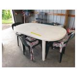 Plastic Patio Table with (4) Plastic Chairs -