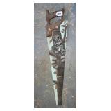 Hand-painted saw measuring 29 in L