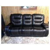Dual-Power Recliner Sofa; appears to be leather,