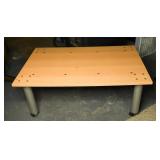 Table on casters; measures approx. 20 in T x 48