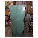 Green Metal Storage Cabinet; measures approx. 60