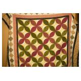 Comforter; measures approx. 85 in x87 in