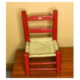 Small wooden straight back doll chair; appears to