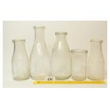 Assortment of Milk Bottles; one is Milk For