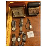 lot of watches and travel clocks