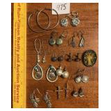 Lot of earrings and an angel brooch