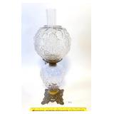 A vintage oil lamp. Located in Dining room