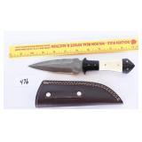 A Damascus blade knife with sheath
