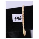 A bracelet marked 10K AZAD