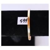 A bracelet marked 14K