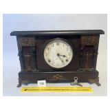 An antique ornate mantel clock. Does come with