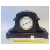 An antique mantel clock does not have a key. It