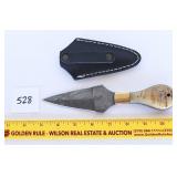 A Damascus blade knife with sheath