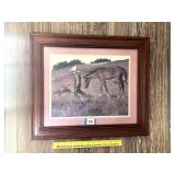 A framed boy with horse print by Jim Daly, 1979.