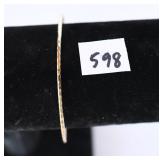 A bracelet marked RCI 10K