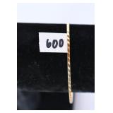A bracelet marked 585