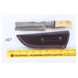 A Damascus knife with sheath