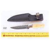 A Damascus knife with sheath