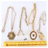 A group lot of necklaces. You have a fox pendant,