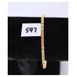 A bracelet marked 14K