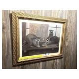 A framed print. It is signed June Bowen Townes -