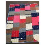 A vintage tack quilt. It measures approx. 62 x 77