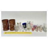 A group lot of shot glasses, two Hawaiian end
