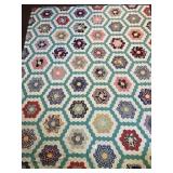 A quilt top. It measures approximately 80 x 98
