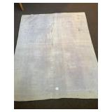 An antique quilt. It does show heavy wear