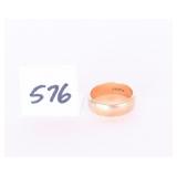 A wedding band it is marked 14k