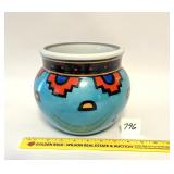 A Southwest designed planter or flower pot -