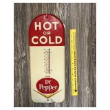 A vintage metal Dr. Pepper thermometer