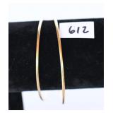 A pair of bracelets. They are marked 14K / P and