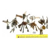 A group lot of vintage keys and keychains