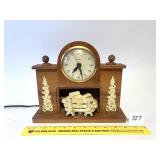 A vintage united clock. - Located in Dining Room