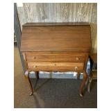 An antique secretary. It measures 37 3/4 tall x