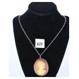 A necklace with a cameo pendant