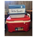 An Igloo Cooler and a smaller Rubbermaid Cooler