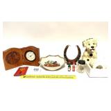 A wooden horse clock, horseshoe candle and a