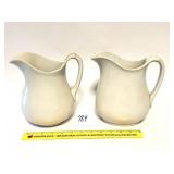 A pair of antique Pitcher - the one on the right