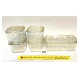 A group lot of vintage refrigerator dishes. A