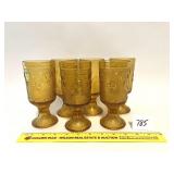 A set of six vintage amber Indiana glass tiara