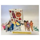 Vintage barbies with doll case.- it appears to be