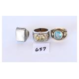 Three rings non are marked. The ring on the left