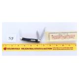 A Schrade Cutlery Minute Man 3 blade knife Battle