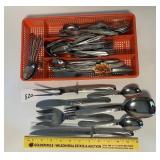 A good lot of flatware - Located in the kitchen.