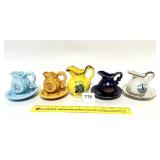 A group lot of vintage souvenir Pitchers, some