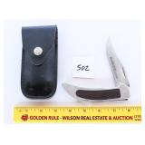 A Smith and Wesson folding knife with case